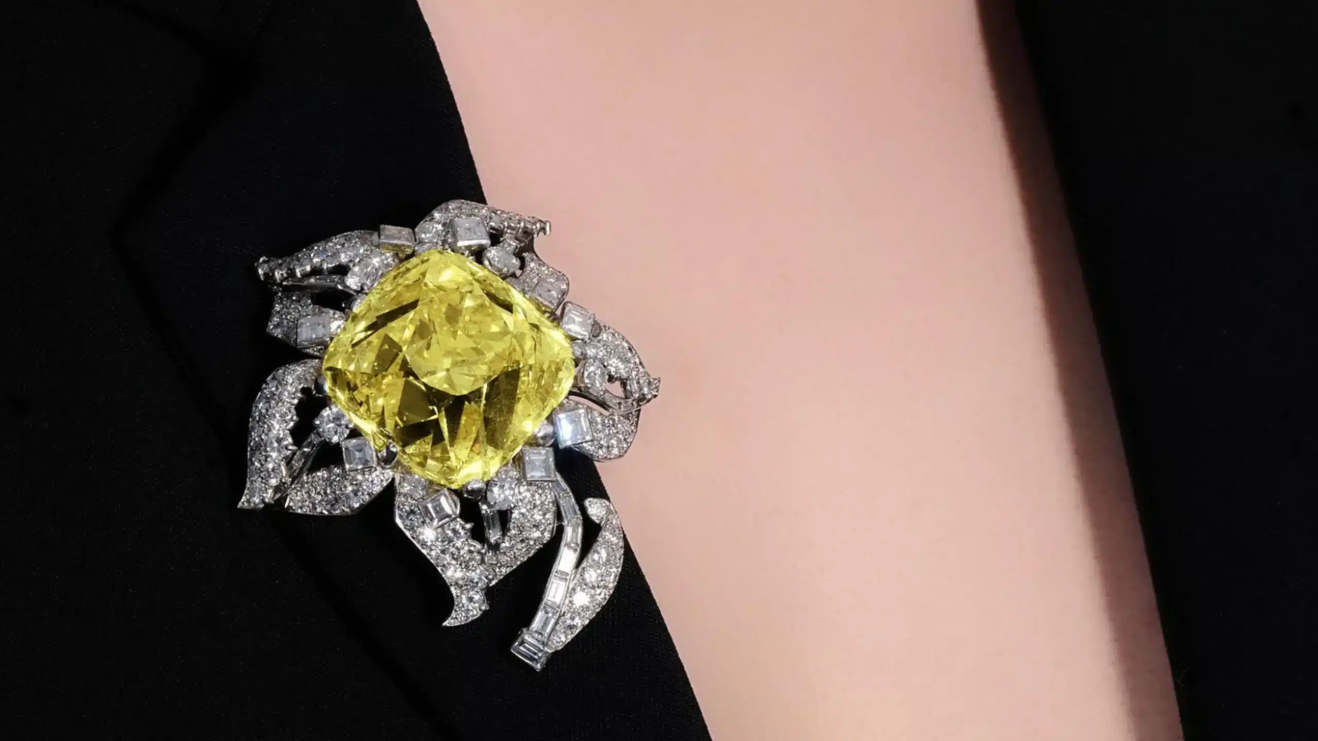 The Allnatt, Historical and Highly Significant Fancy Vivid Yellow diamond and diamond brooch, circa 1952